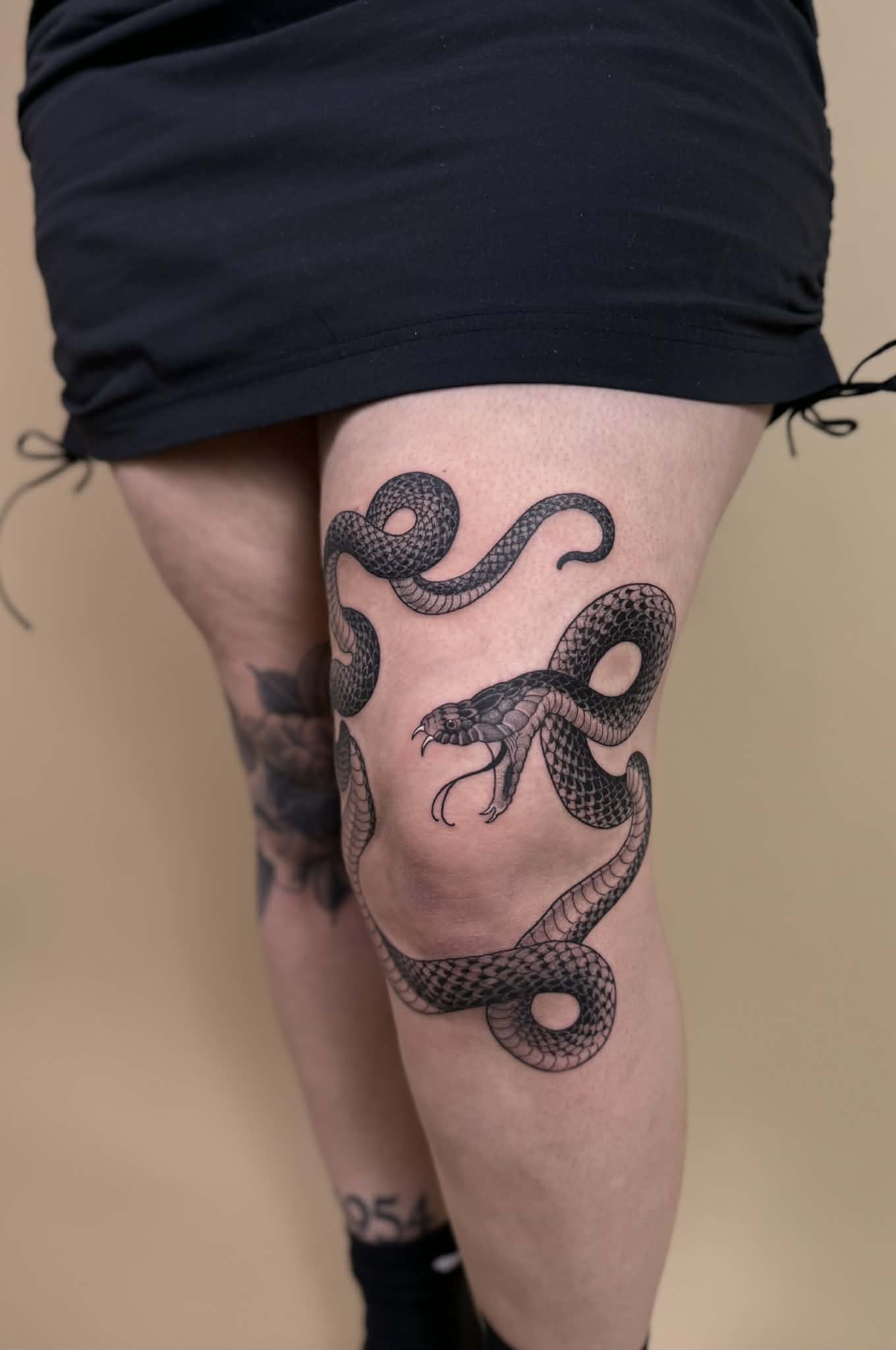 Illustrative floral leg tattoo by Jena — Gold Scarab Tattoo Seattle